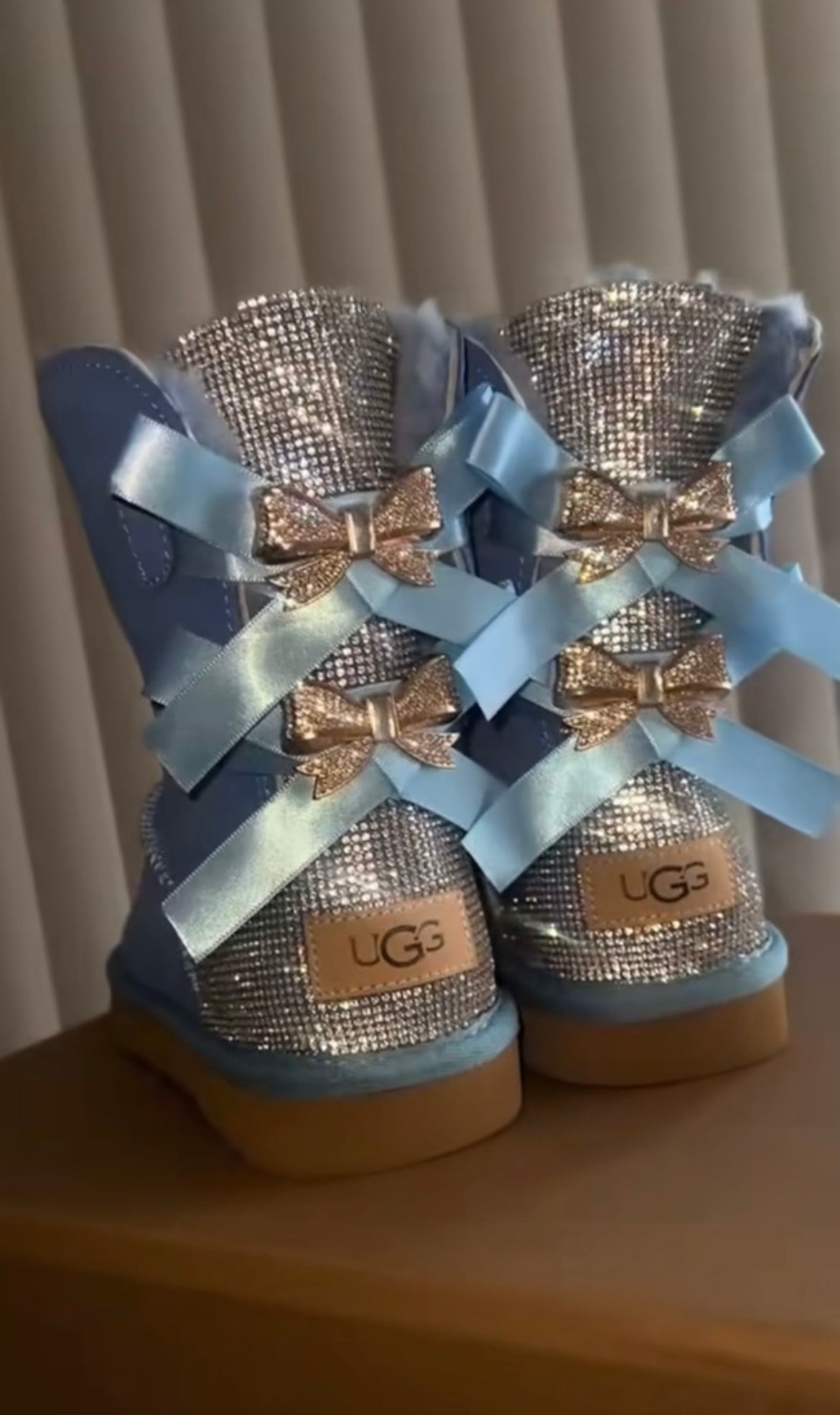 Light blue uggs with bows best sale